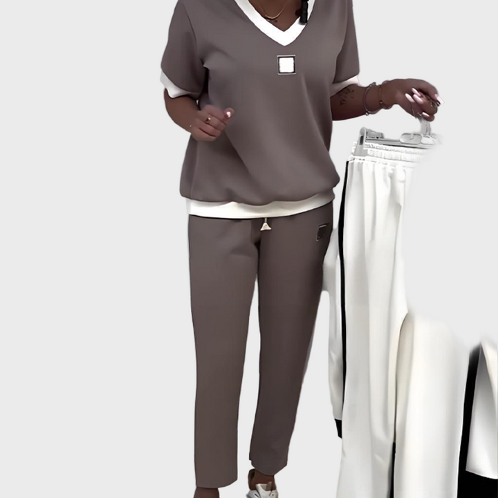 Dámská souprava s topem a kalhotami s výstřihem do V